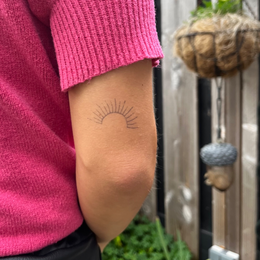 Tymczasowy tatuaż słońce