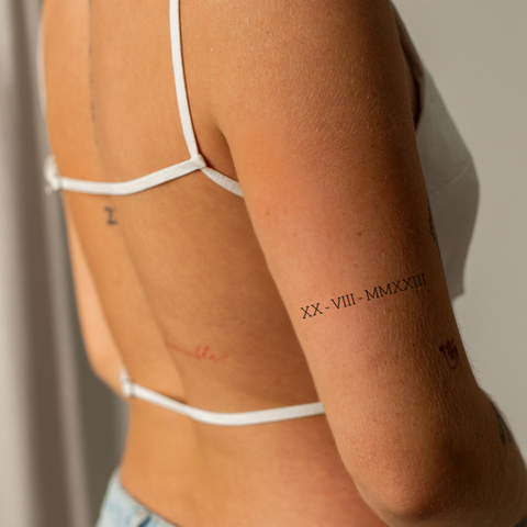 Tatuaż z cyframi rzymskimi