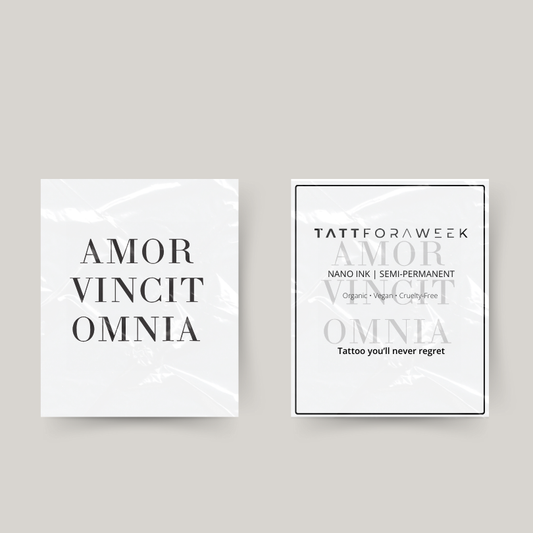 Tymczasowy tatuaż amor vincit omnia